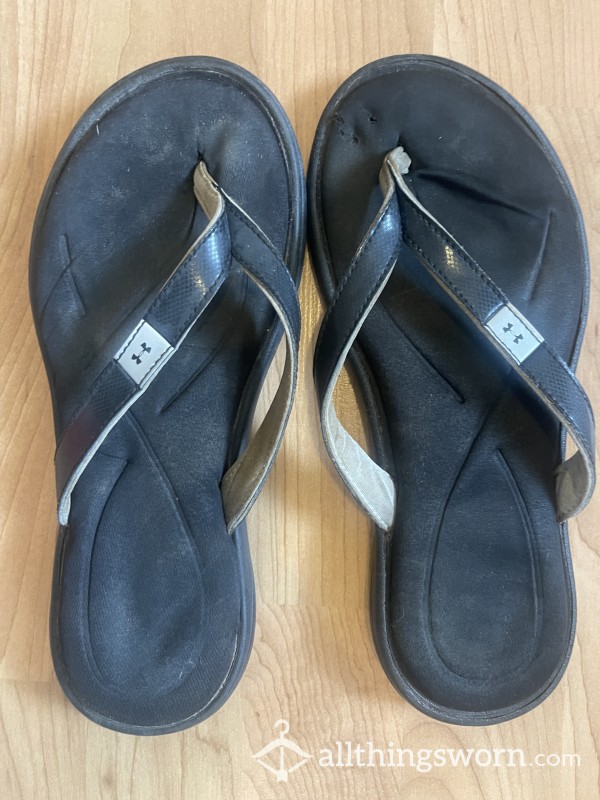 Black Well Worn Stinky Under Armour Flip Flops