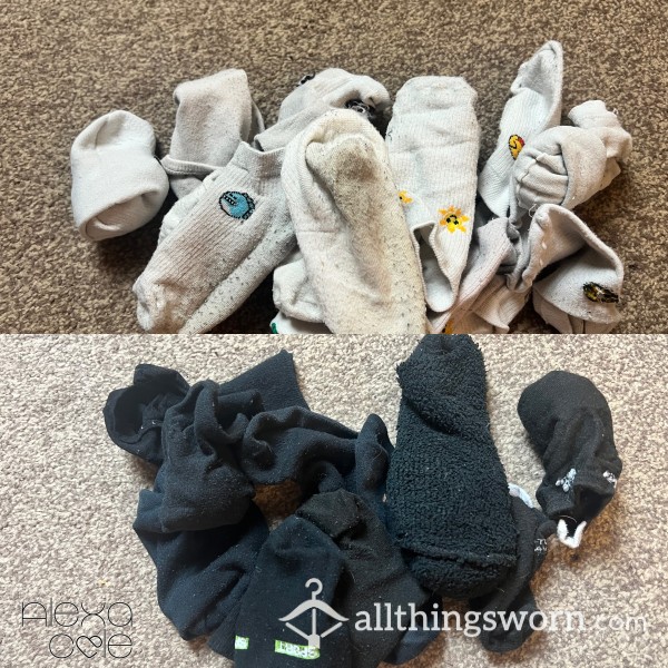 Bundle Of White & Black Worn Socks Buy Both Get A Mystery Sock Bundle Free.