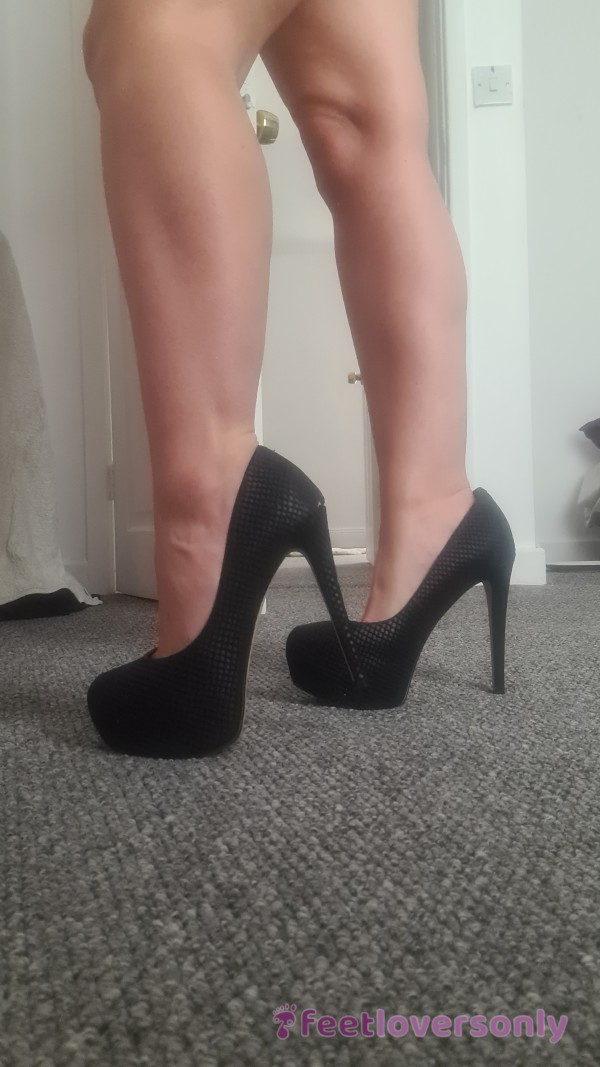 Feet In Black Stilettos