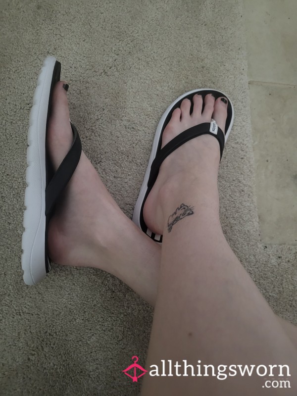 Old Black And White Flip Flops