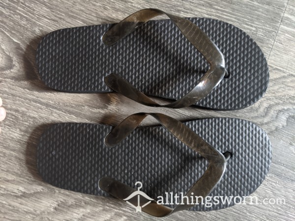 Old Black Flip Flops