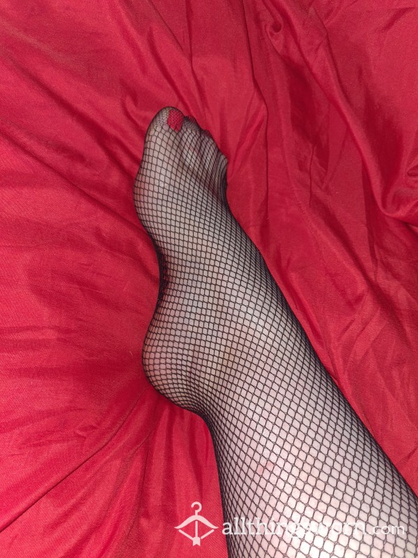 Relaxing In Black Fishnets.