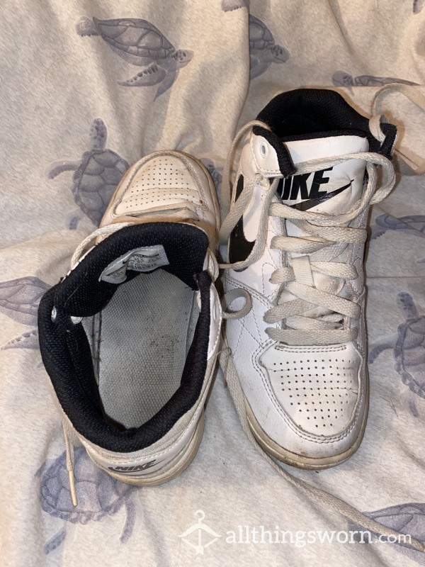 Very Well Worn Nike Trainers