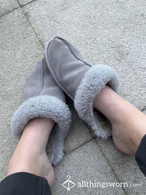 VERY WORN UGG SLIPPERS