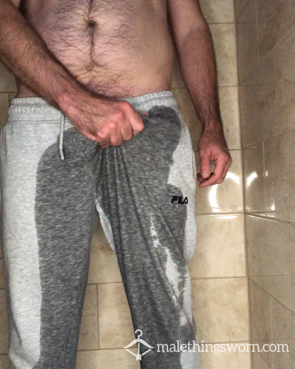 VIDEO: Dad Pi*sing In Grey FILA Joggers With A Semi