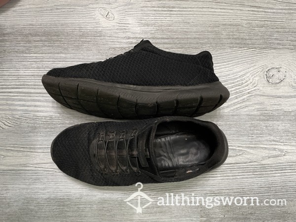 WELL-worn Black Sketchers