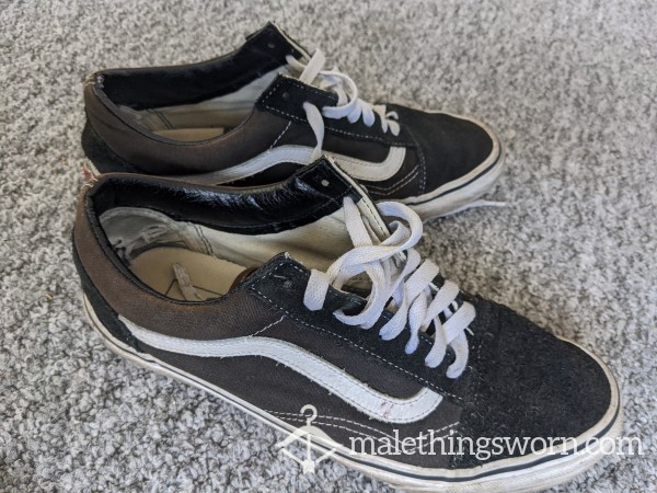 Well-worn Black Vans