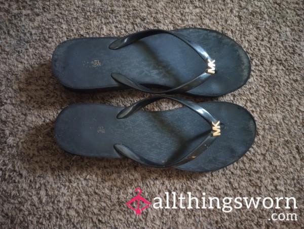 Well Worn Michael Kors Flip Flops