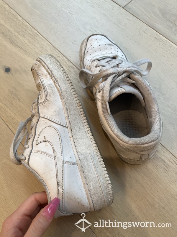 Well-worn Nike Air Force Sneakers