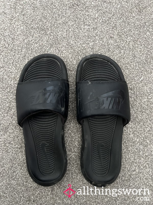 Well Worn Nike Slides