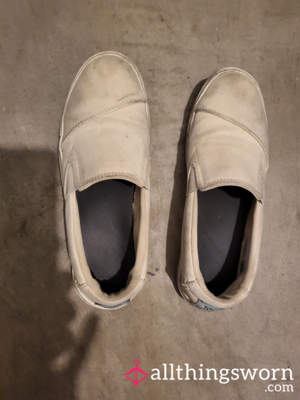 Well-worn Tom's Sneakers