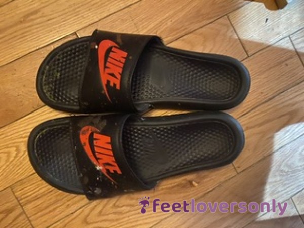 Well Worn Used Nike Slippers