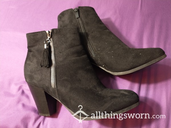 Worn Black Heeled Boots