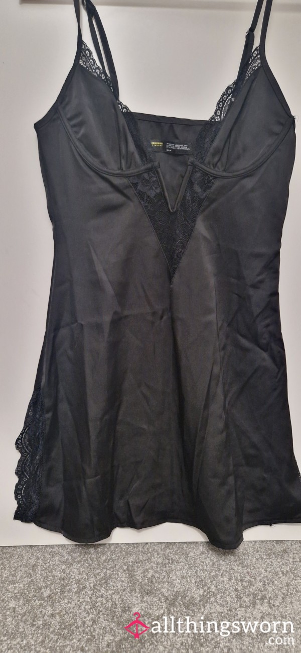 Worn Black S**y Silk Dress