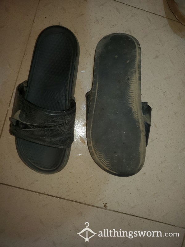 Worn Out Nike Slides