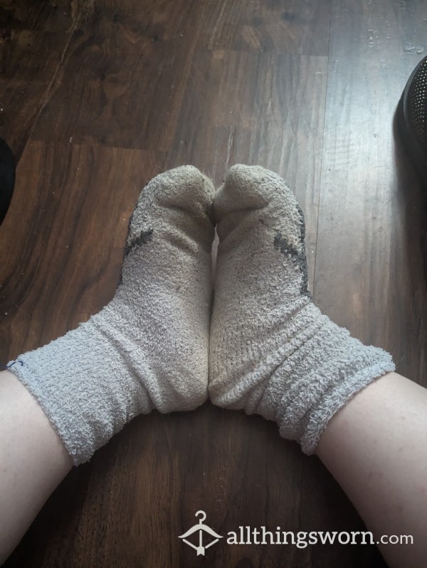 Worn, Stained, Fuzzy Penguin Socks